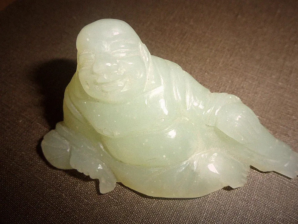 Pale Green small reclining Budha sculpture carving